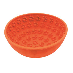 Comedero interactivo naranja de silicona con diseño de huellas para estimular el lamido en perros y mejorar su bienestar.