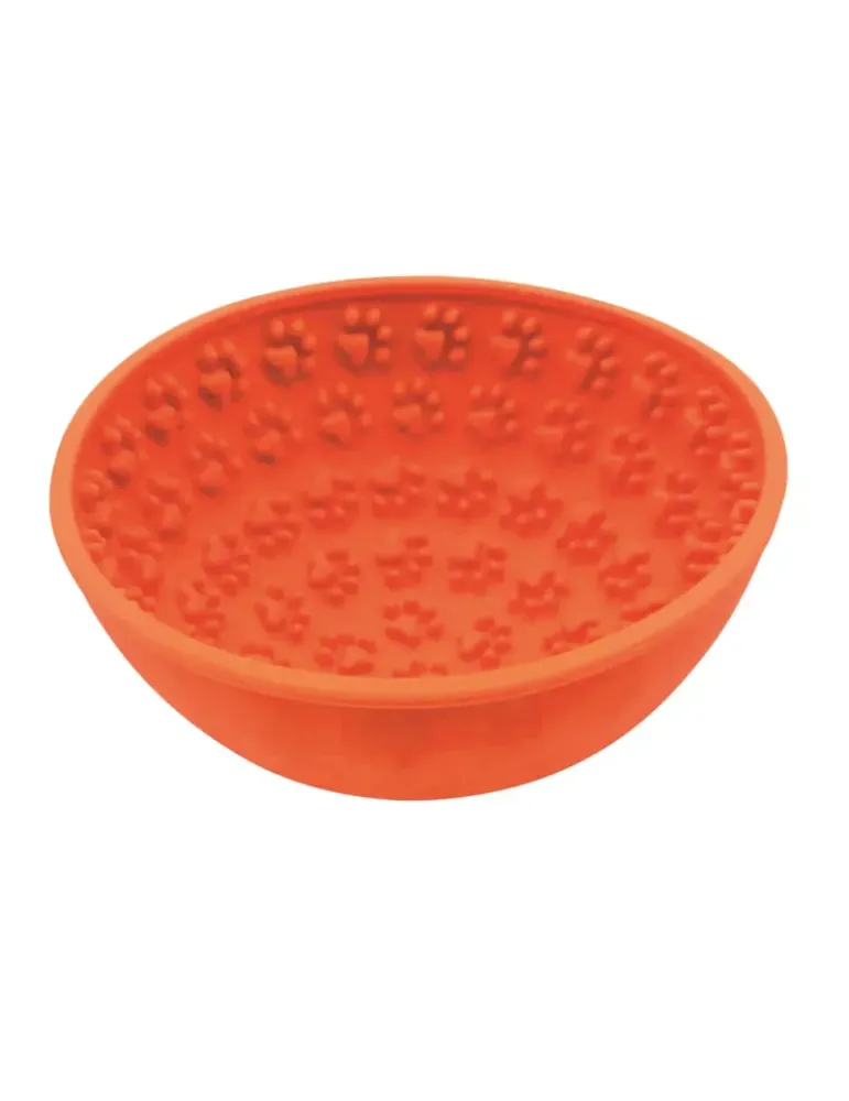 Comedero interactivo naranja de silicona con diseño de huellas para estimular el lamido en perros y mejorar su bienestar.
