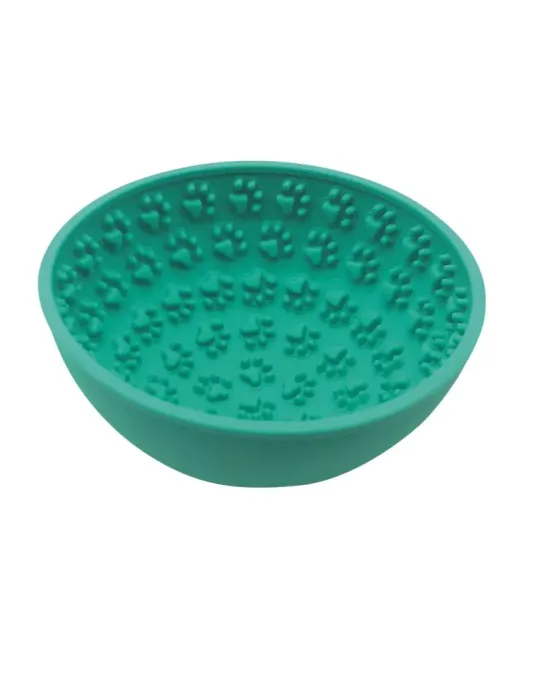 Comedero interactivo verde para perros de silicona con relieve de huellas, ideal para lamer, reducir ansiedad y comer más lento.