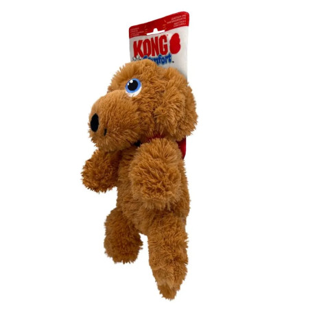 Vista lateral del peluche para perros KONG Comfort Tykes en forma de perro marrón, con etiqueta roja y felpa suave.