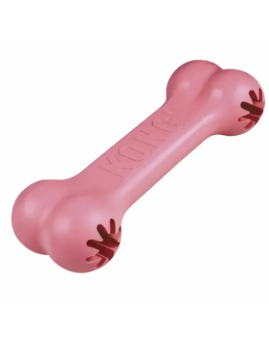 Juguete para cachorro KONG Goodie Bone color rosa, de caucho blando con ranuras para premios.